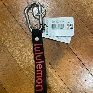 Lululemon Black and Red Keychain